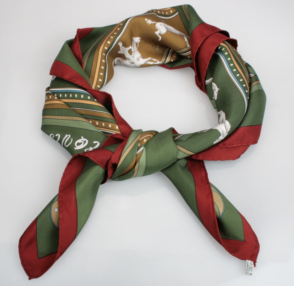 This is an interesting scarf depicting images of horses in motion. This scarf would look great framed.