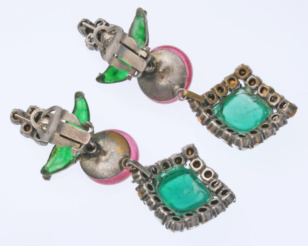 These are stunning poured glass earrings from the 1950's. The color is beautiful. They are marked France.