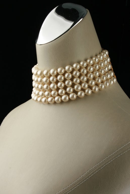 This necklace is so quintessentially CHANEL. It can be worn alone as a choker or paired with another strand of pearls. Adjustable from 13 1/4 