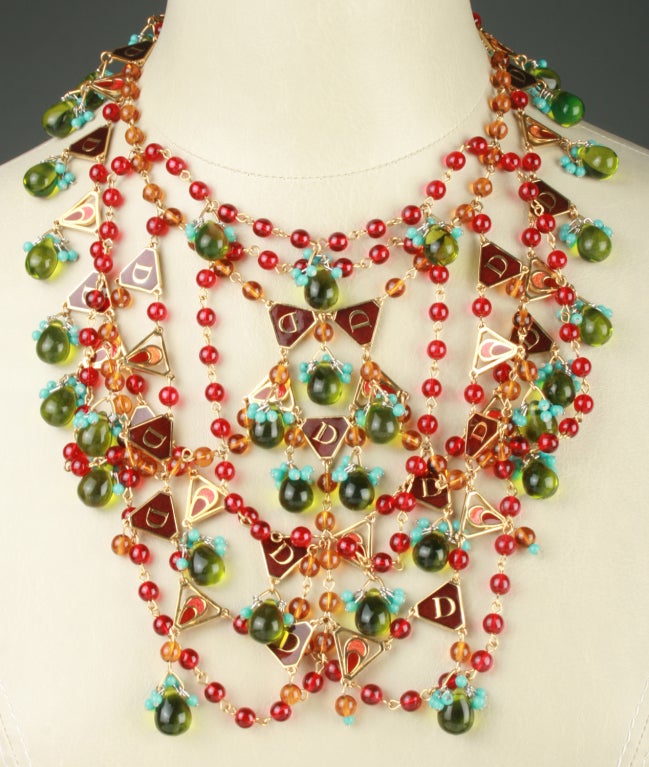 Enamelled triangles and decorative poured glass jewels make this an outstanding necklace by Christian Dior.  The necklace  is adjustable from 16-20