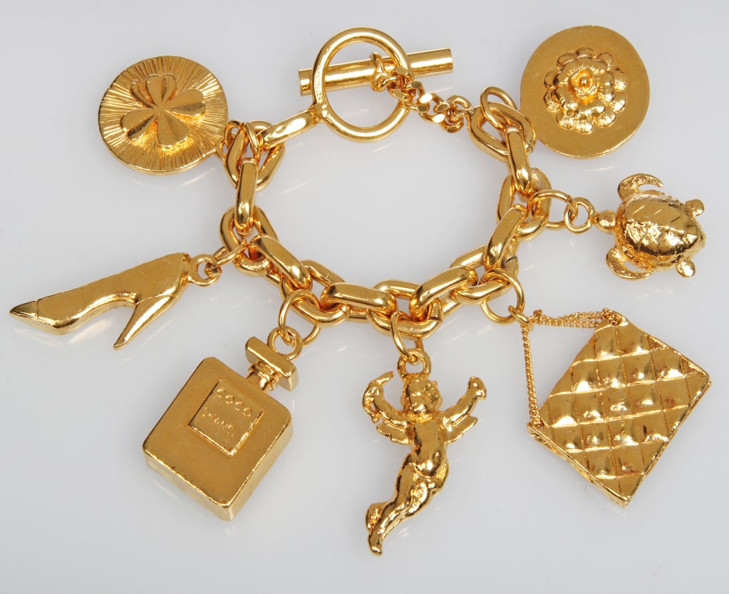 Iconic Large CHANEL Charm Bracelet In Excellent Condition In Chicago, IL