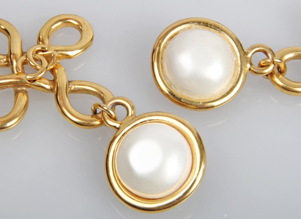 CHANEL Logo Dangle Earrings with Faux Pearl In Excellent Condition In Chicago, IL