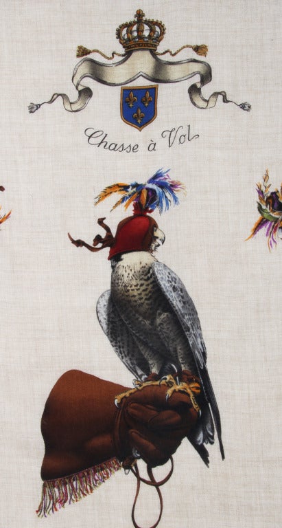 This Hermes scarf highlights the ancient art of falconry. This is an early version of the scarf from the mid 1960's
Signed in the scarf....Henri de Linares, Hermes Paris