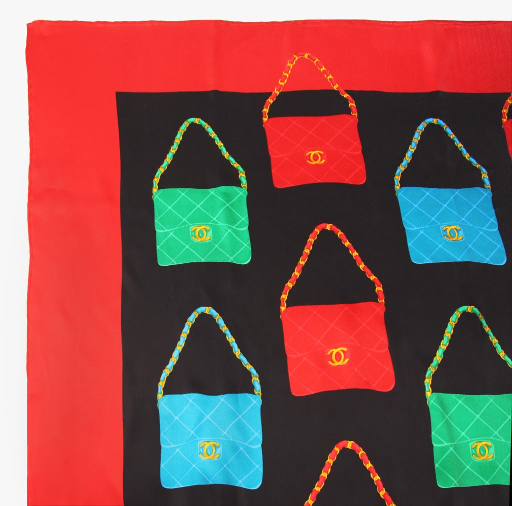 This is a fun, colorful and graphic silk scarf made by CHANEL .
