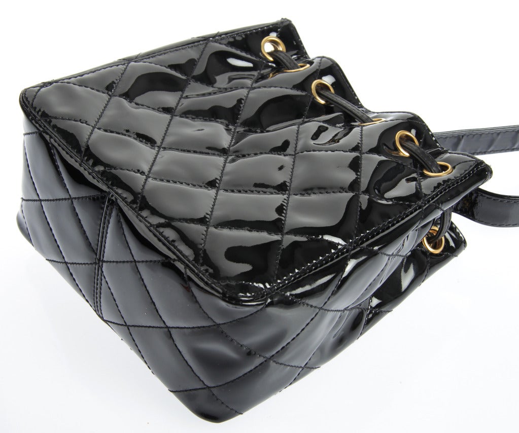 Women's Chanel Black Quilted Patent Leather Drawstring Bag