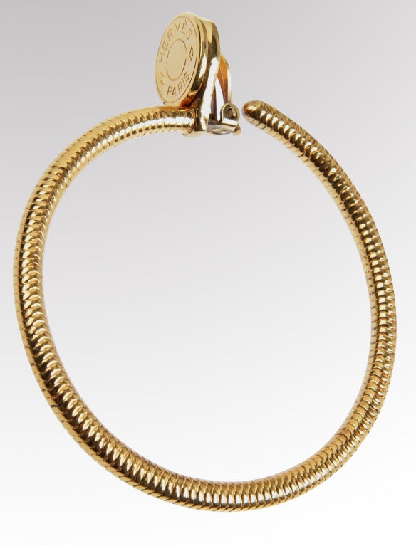 These are large and fabulous textured hoops sporting the HERMES name on the ear clip.