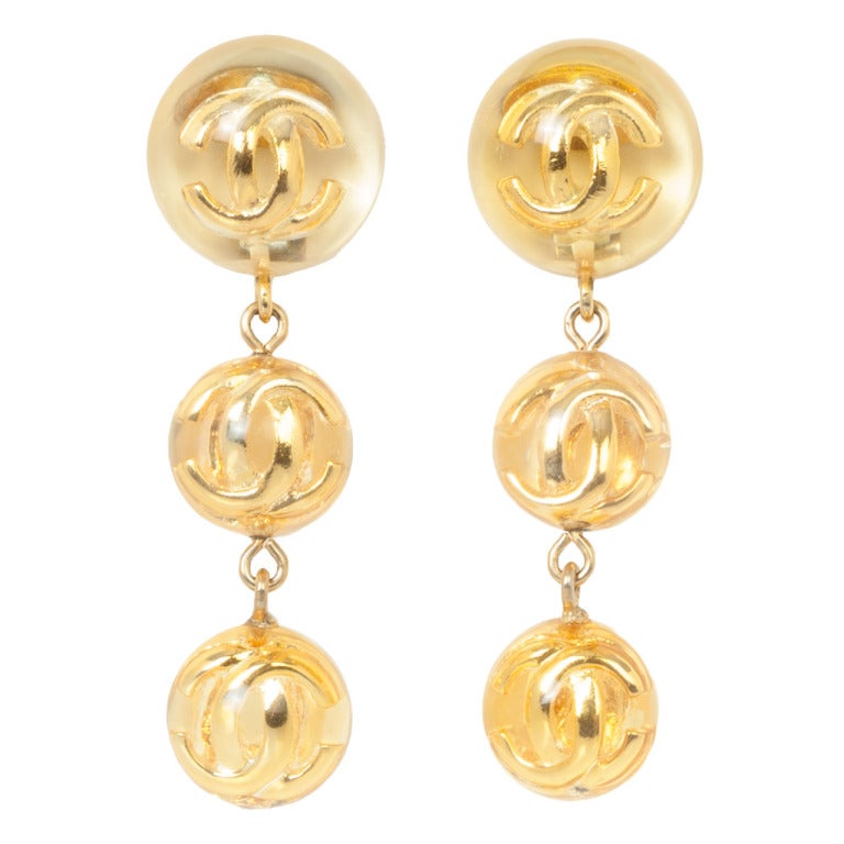 Golden Lucite CHANEL Logo Earrings