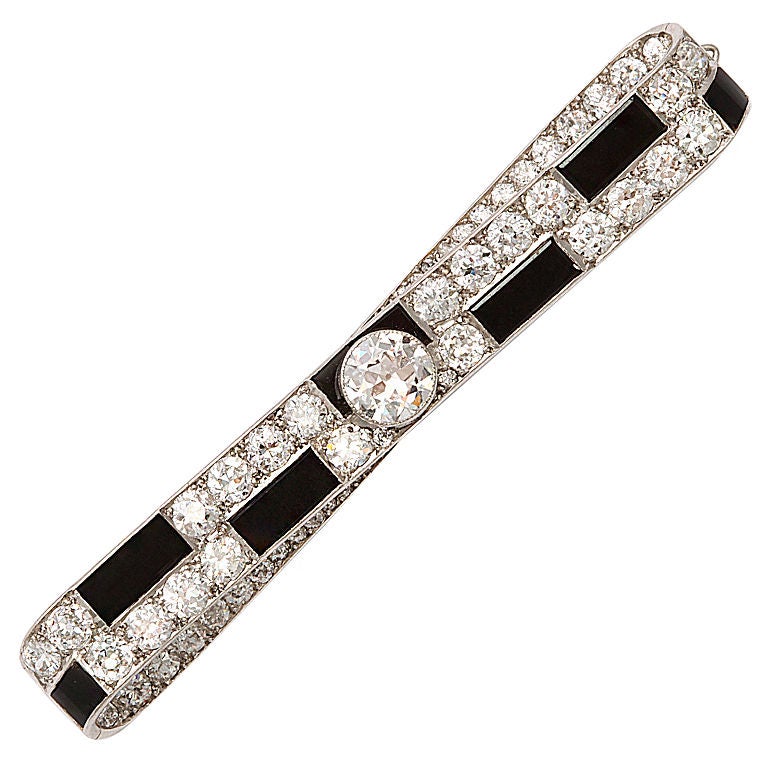 CARTIER Art Deco Onyx and Diamond Bar Brooch For Sale