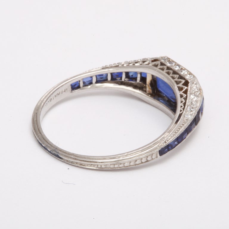 Sapphire and diamond ring set in platinum by Tiffany and Company.