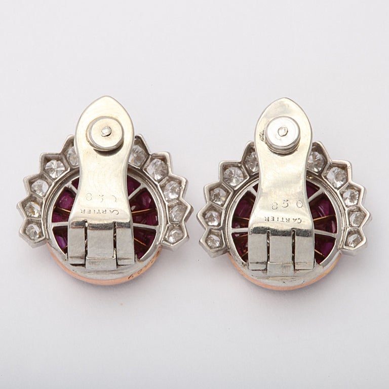 Pair of Cartier, New York, Burma ruby and diamond clip earrings, mounted in platinum.