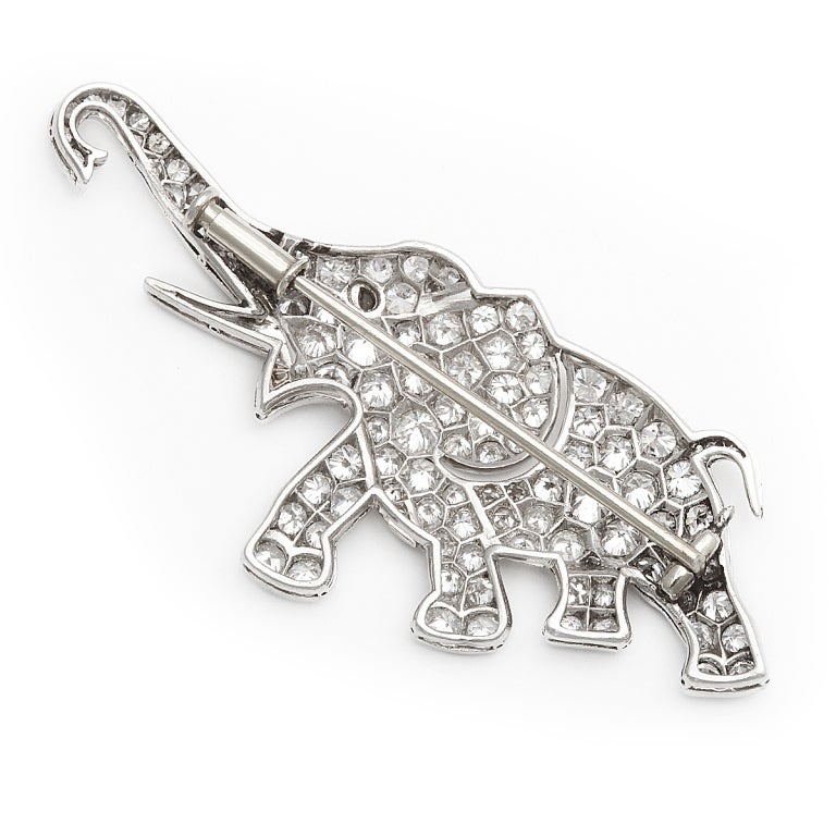 Pavé diamond-set elephant brooch, backed in platinum.
Length: 2-1/8 inches