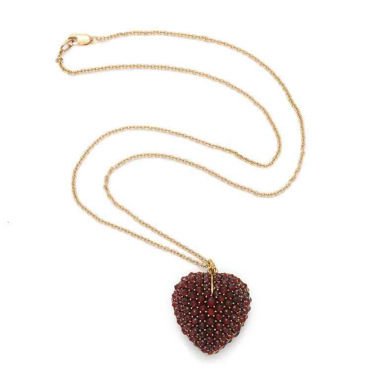 Garnets set in a 9 carat gold heart locket.