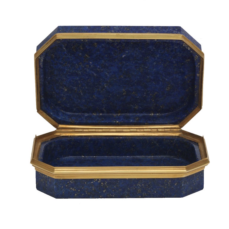 Lapis lazuli box with chamfered corners and gold beveled mounts.
3-3/8 x 2-3/8 x 1 inch