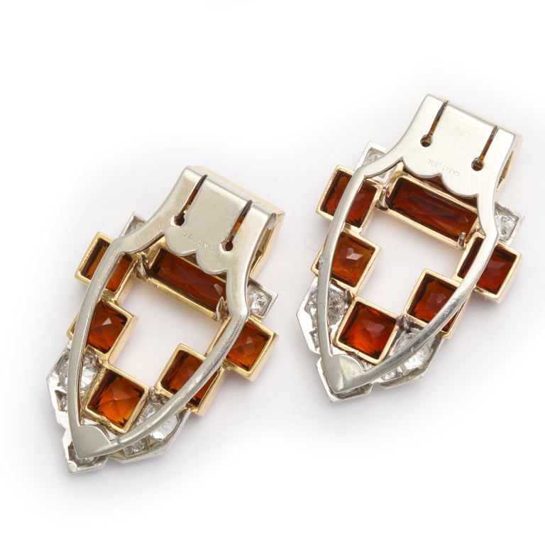 Citrine and diamond Cartier dress clips set in platinum. In original Cartier NY fitted box.

New York, ca. 1940
Length: 3.5 mm
Width: 2 mm