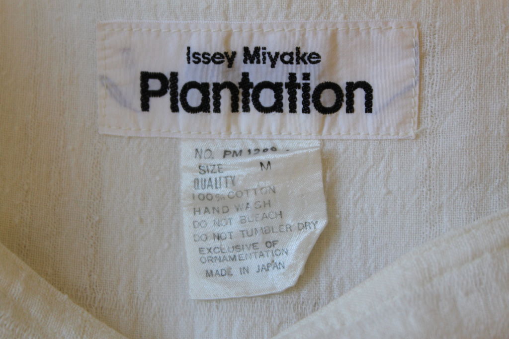 Very oversized off-white layered, textured cotton top from Issey Miyake for Plantation dating to the early 1980s. Top measures approximately 60
