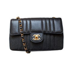 Vintage CHANEL black caviar Mademoiselle flap bag with gilt chain