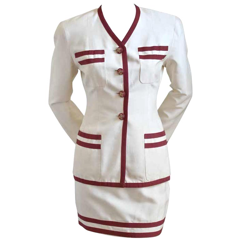 1980
s CHANEL cream silk mini skirt suit with red ribbon trim
