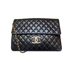 oversized CHANEL convertible black leather quilted messenger bag
