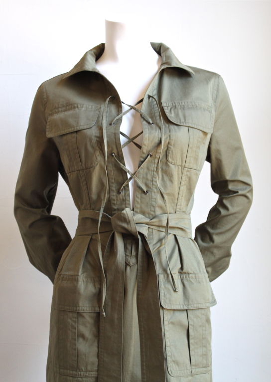 Very rare army green safari dress designed by Tom Ford for Yves Saint Laurent dating to the late 1990's. French size 38. Dress measures 34-36