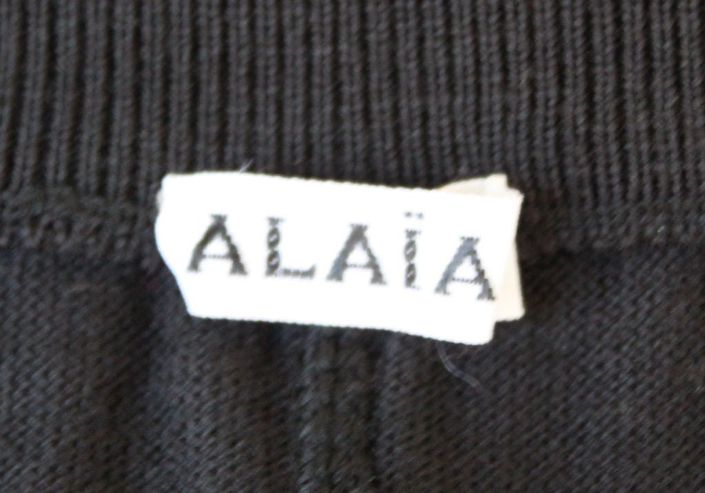 Black AZZEDINE ALAIA black wool dress with seamed flared skirt For Sale
