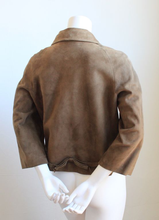 Mushroom brown suede cropped jacket from Spanish design house Loewe dating to the 1960's. Labeled a 46 although this runs small and fits a US 4 to an 8 max. Made in Spain. Very good condition.