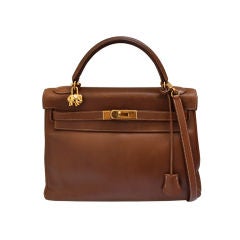 HERMES gold courchevel 32 cm KELLY with gilt hardware & strap