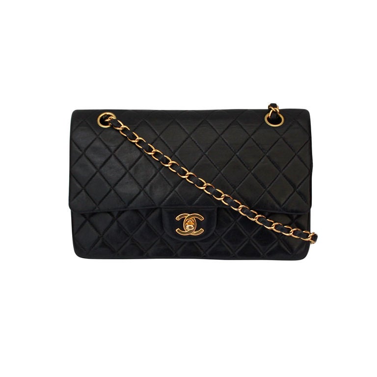 CHANEL black quilted leather flap bag with gold hardware For Sale