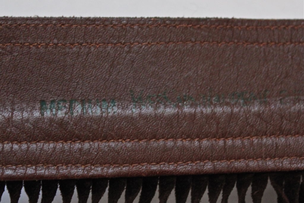 YVES SAINT LAURENT pony fur & brown suede fringed belt