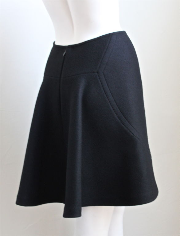 Jet black thick wool A line skirt with top-stitching from Azzedine Alaia. French size 40 although this runs small (27
