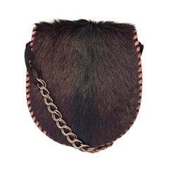 Vintage YVES SAINT LAURENT goat fur and suede bag with chain strap