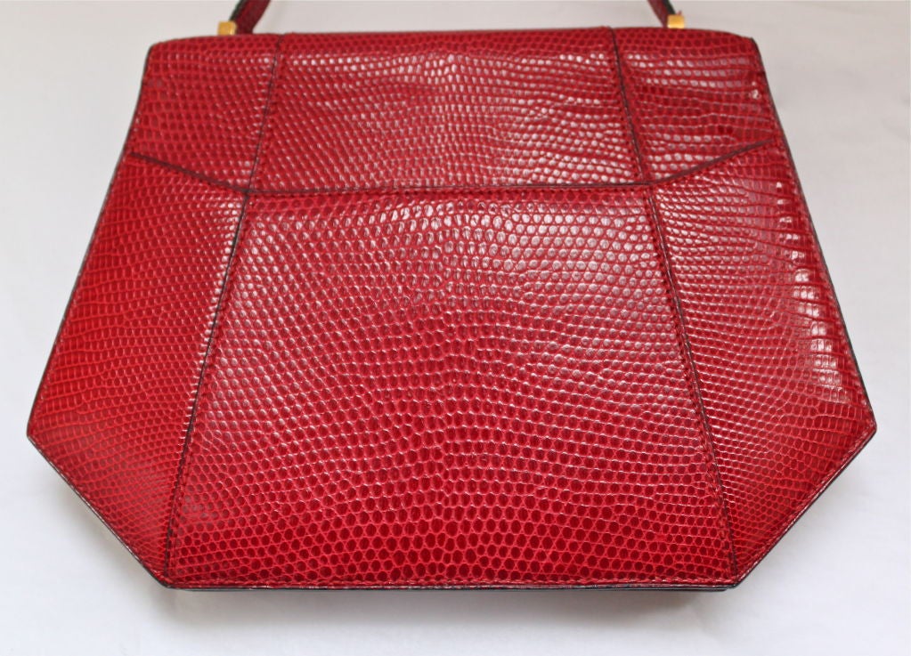 Women's HERMES red lizard bag with gild lock hardware