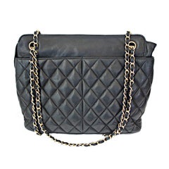 1980's CHANEL navy blue quilted leather bag with gilt hardware