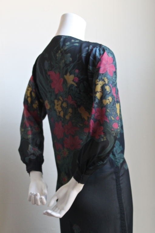 Sheer floral silk dress with drawstring hemline from Sonia Rykiel dating to the late 1970's. Fits a US 2 or slim 4. Slips on over the head and secures at neck with asymmetrically placed buttons and hidden snaps. Made in France. Excellent condition.