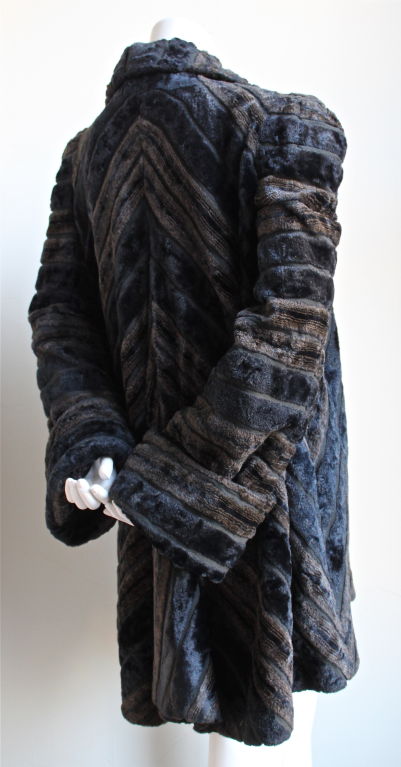 Art deco inspired faux fur coat from Biba dating to the late 1960's. Fits most sizes due to the cut. Open closure. Fully lined. Very good condition.