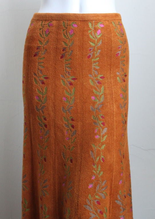 Very rare pumpkin colored floor length knit skirt with floral detail from Azzedine Alaia dating to the late 1990's. Fits a size 2-6 (very stretchy knit). Made in Italy. Excellent condition.