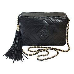 80's CHANEL black quilted lambskin leather bag with large tassel