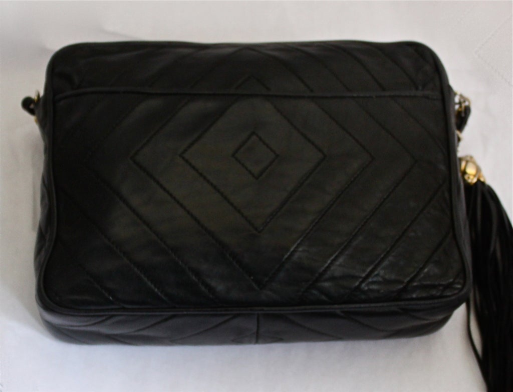80's CHANEL black quilted lambskin leather bag with large tassel