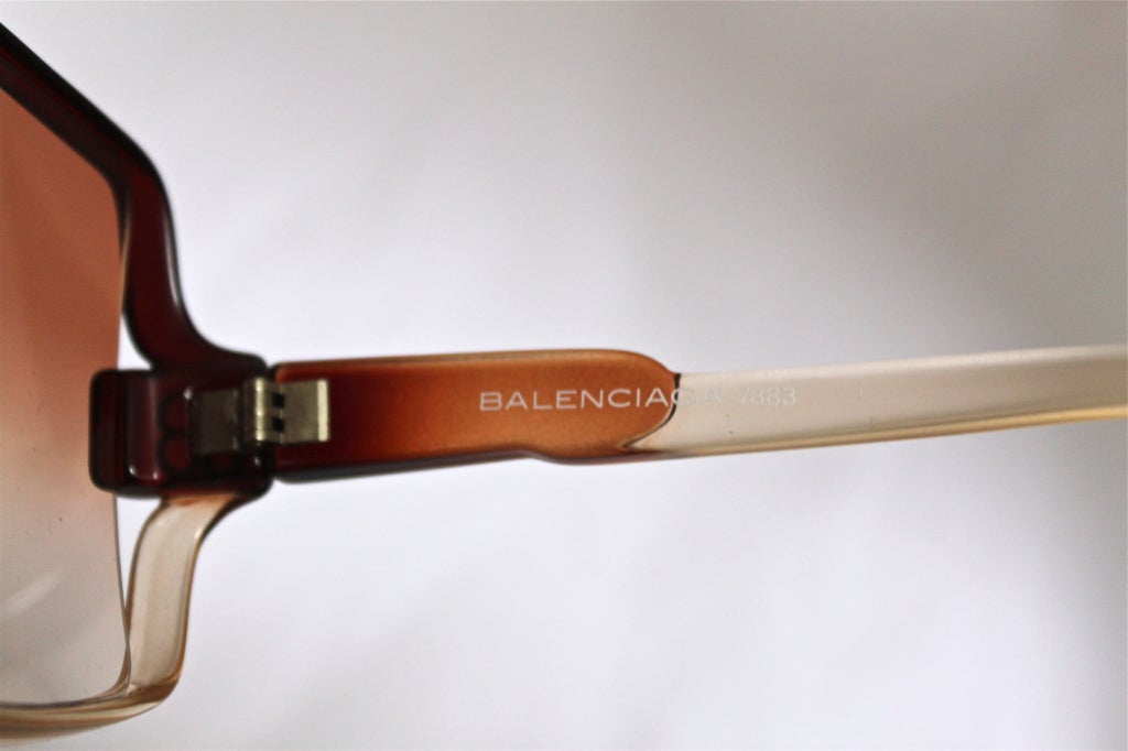 Oversized brown/clear gradient sunglasses with rosey-brown lenses from Balenciaga dating to the 1970's. Made in France. Very good condition.