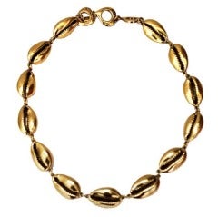 Retro YVES SAINT LAURENT oversized gilt cowrie seashell necklace