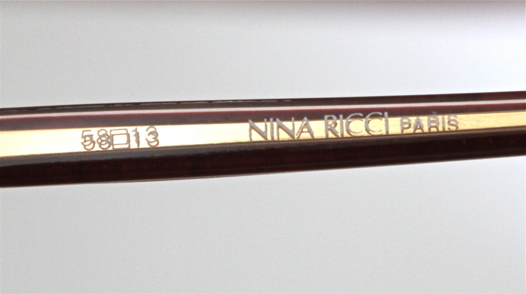 Women's unworn NINA RICCI rose & gold sunglasses