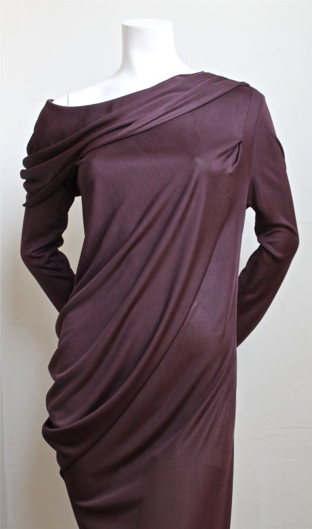 Very rare and unique draped jersey gown with asymmetrical neckline created by Alexander McQueen for the  Spring 1996 'Hunger' collection. Colors are a deep burgundy woven with black.  Fits a size small or medium. Made in Italy. Very good condition.