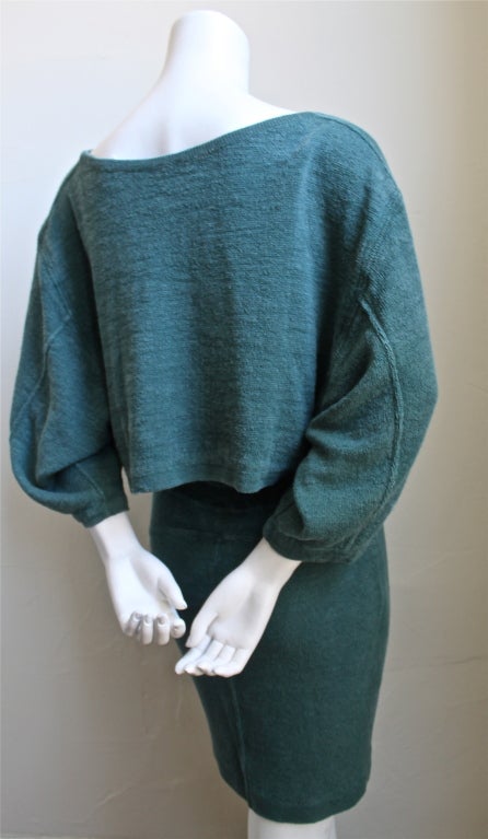 Soft turquoise linen knit ensemble consisting of a cropped sweater and seamed high waisted skirt from Azzedine Alaia dating to the 1980's. Labeled a size small. Made in Italy.  Very good condition.