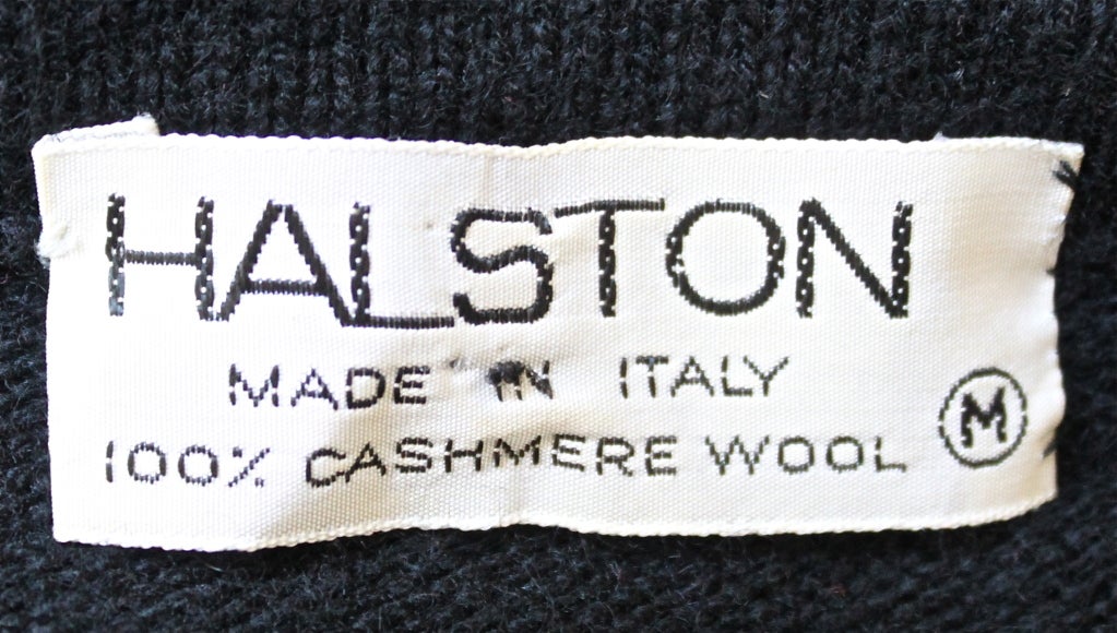 Very soft jet black cashmere caftan from Halston dating to the 1970's. Labeled a size medium, although this fits most sizes. Made in Scotland. Excellent condition.