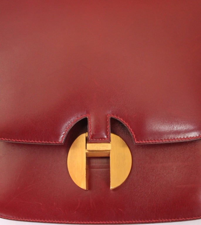 Women's 1972 Hermes burgundy leather bag with gilt brushed hardware
