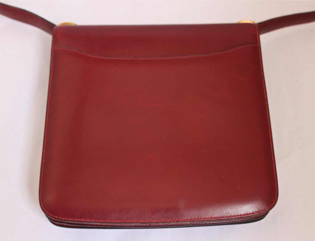 1972 Hermes burgundy leather bag with gilt brushed hardware 1