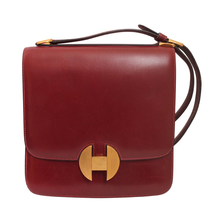1972 Hermes burgundy leather bag with gilt brushed hardware