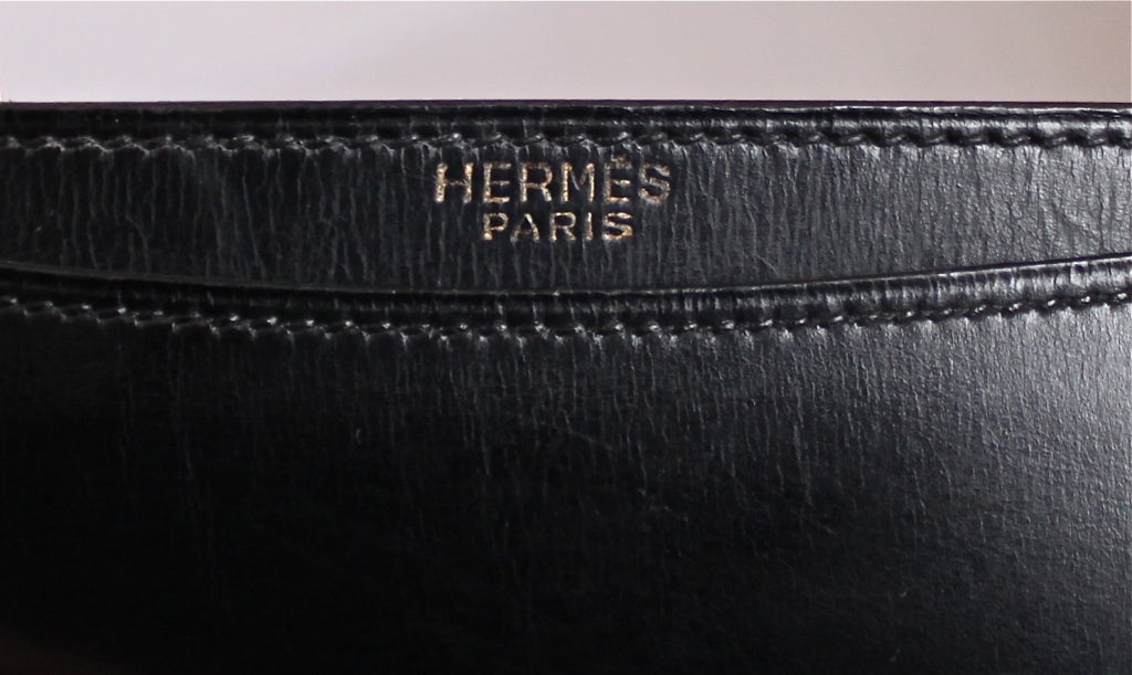 Women's 1970's HERMES jet black box leather bag with gilt hardware