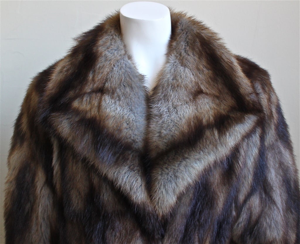 Very rare fitch fur coat designed by Karl Lagerfeld fir Fendi dating to the 1980's. Fits a size small or medium. Coat measures approximately 17