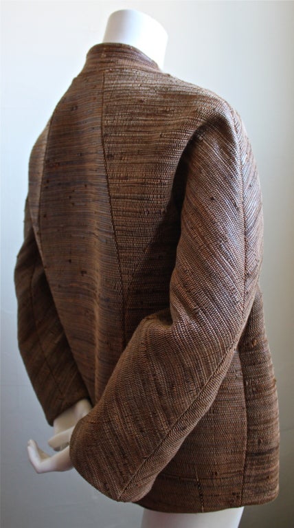 Show stopping loom woven couture leather jacket from Chado Ralph Rucci. The color is a rich congnac-brown and the leather has natural variations which create an amazing texture. The jacket has the perfect amount of contrast with its tailored,