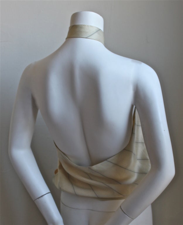 Very rare striped silk blouse with halter 'tie' designed by Alexander McQueen dating to the 1990's. Fits a size 2 or 4. Made in Italy. Excellent condition.